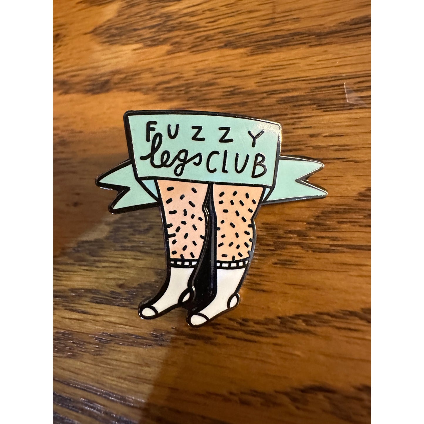 Fuzzy Legs Club Pinback Label Pin